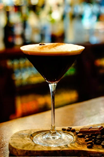 An espresso martini served on the bar at Guys Bar