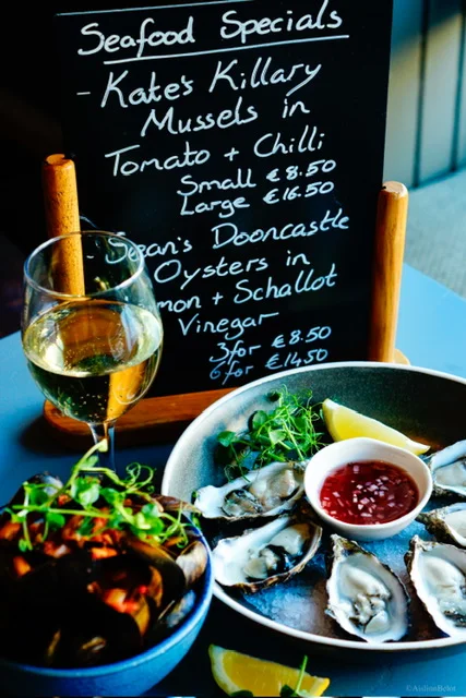 Oysters, mussels and seafood specials on the table at Guys Bar