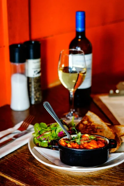 Prawns in chilli sauce served with wine at Guys Bar